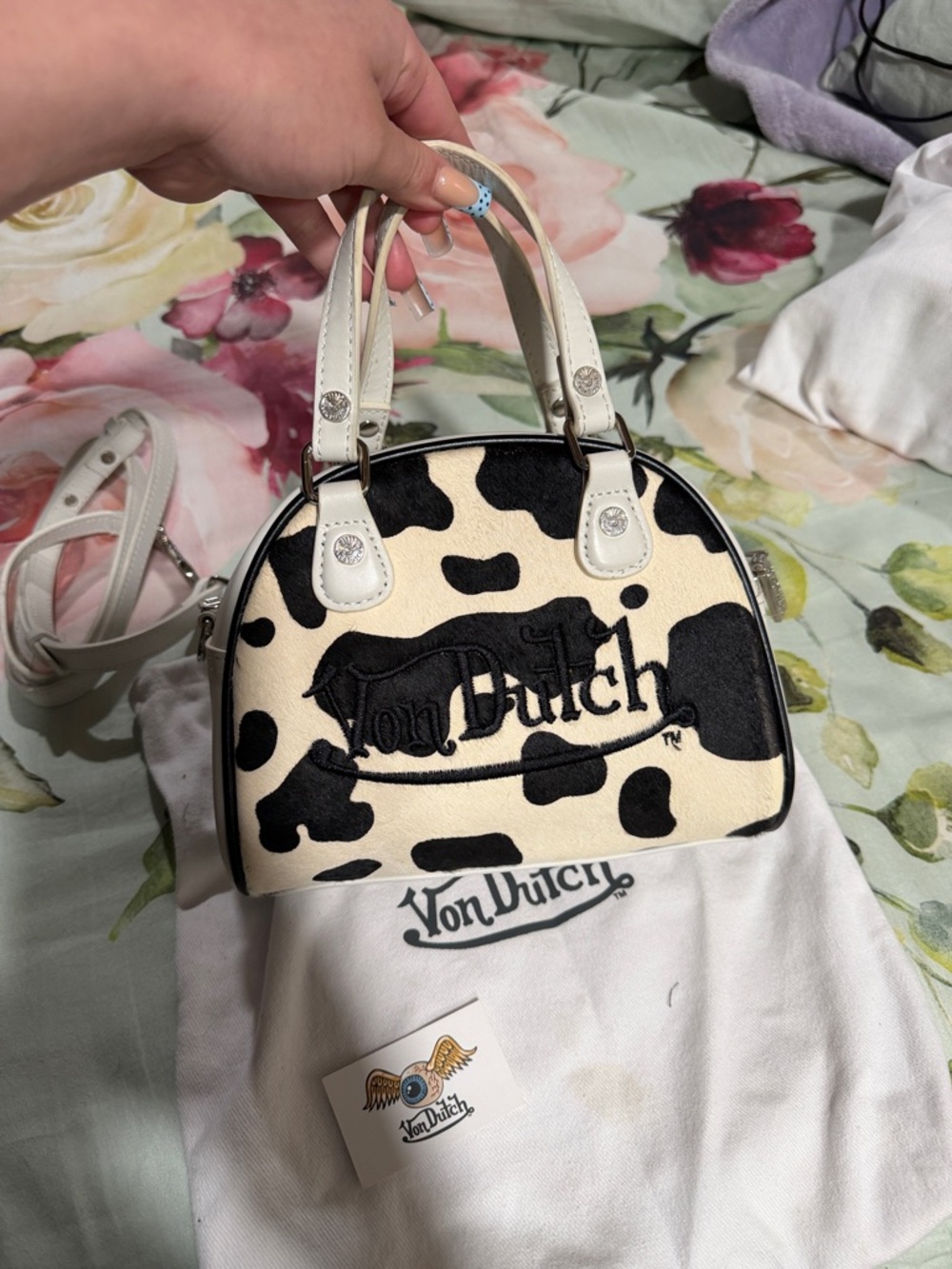 Von Dutch Black and Cream Cow-Print bowling bag